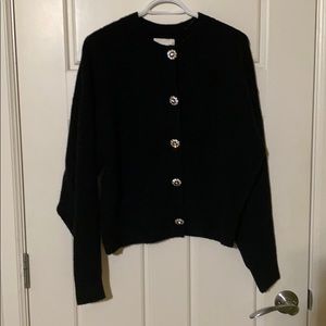 Cropped fuzzy sweater.